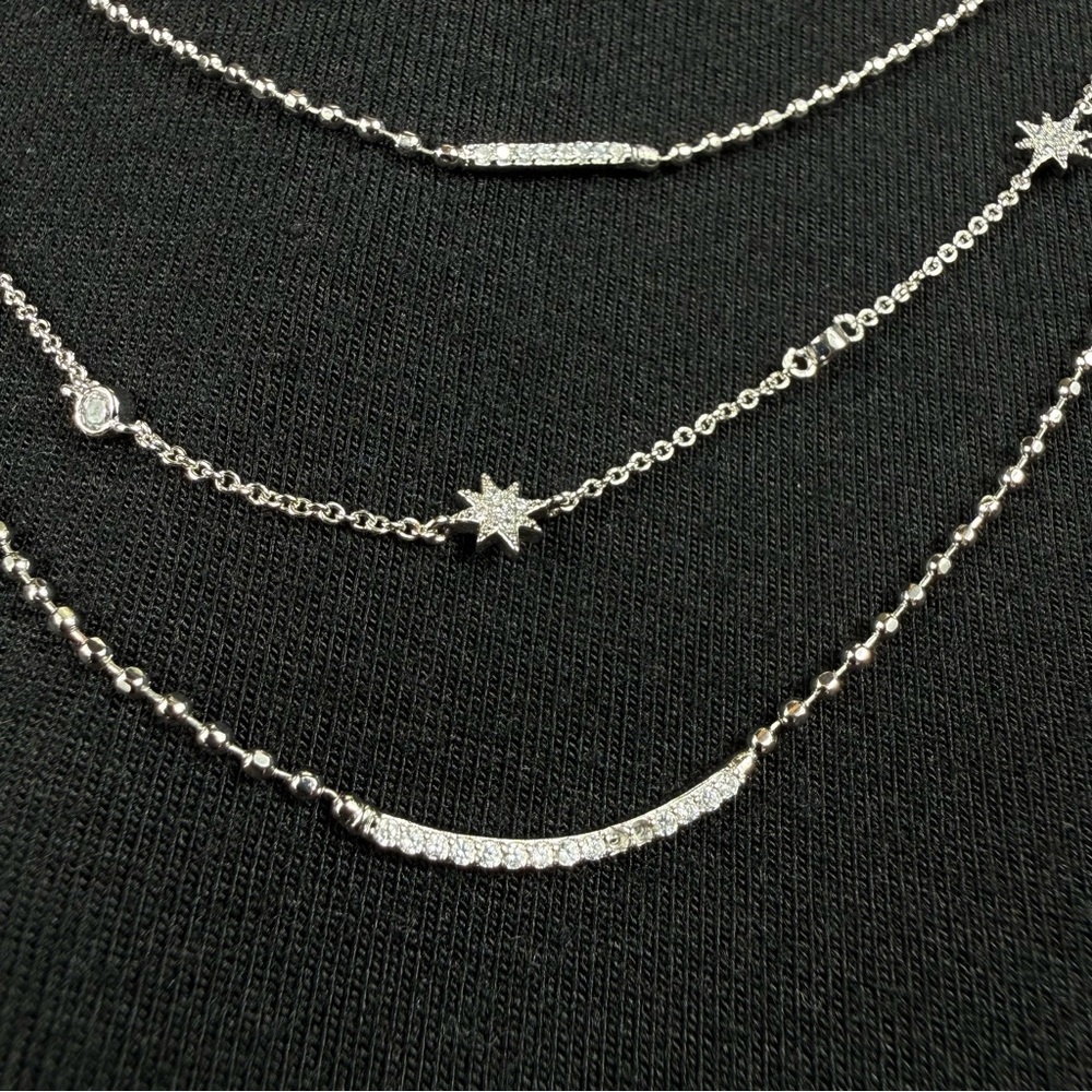 Express Silver tone Multi-strand Layer necklace.